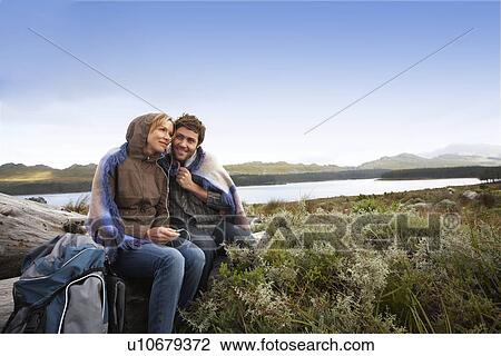 Stock Image - Couple on a hiking trip. Fotosearch