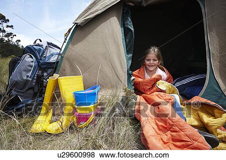 Cute girl in a tent View Large Photo Image Stock Photo - Cute girl in a tent. Fotosearch
