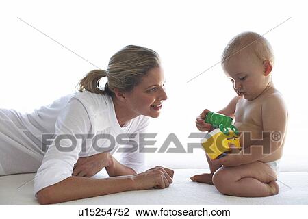 Cute mother and baby View Large Photo Image Stock Image - Cute mother and baby. Fotosearch