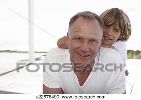 Stock Image - Dad with his son. Fotosearch