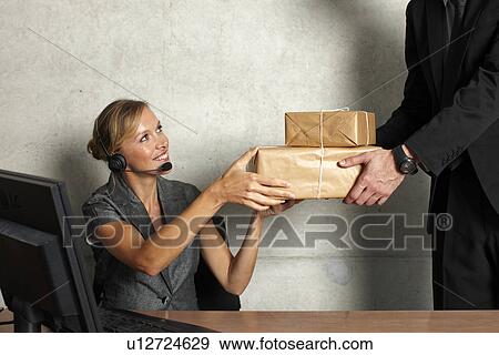 Stock Photo - Delivery at the office. Fotosearch