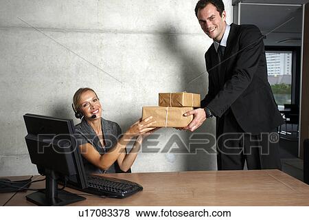 Delivery at the office View Large Photo Image Stock Photo - Delivery at the office. Fotosearch