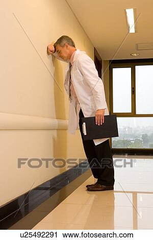 Stock Image - Depressed doctor. Fotosearch