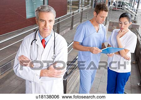 Doctor and nurses View Large Photo Image Stock Photograph - Doctor and nurses. Fotosearch