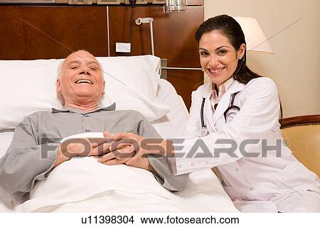 Doctor and patient View Large Photo Image Picture - Doctor and patient. Fotosearch