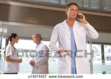 Stock Photo - Doctor making a call. Fotosearch