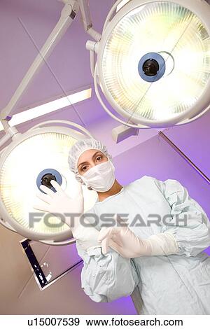 Stock Photo - Doctor preparing for operation. Fotosearch