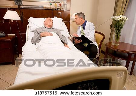 Doctor visiting patient View Large Photo Image Stock Photography - Doctor visiting patient. Fotosearch