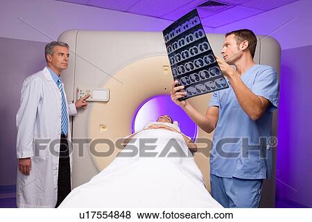 Doctors at work View Large Photo Image Stock Photo - Doctors at work. Fotosearch