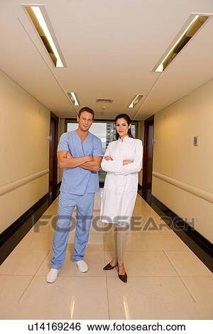 Doctors colleagues at work View Large Photo Image Stock Photograph - Doctors colleagues at work. Fotosearch