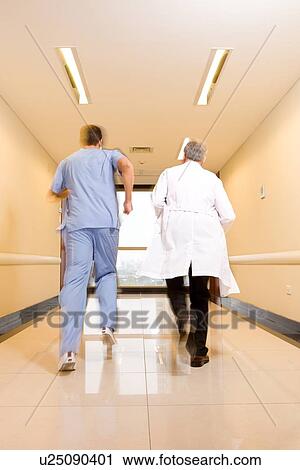 Doctors having an emergency View Large Photo Image Stock Image - Doctors having an emergency. Fotosearch