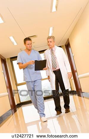 Stock Image - Doctors in a hurry. Fotosearch