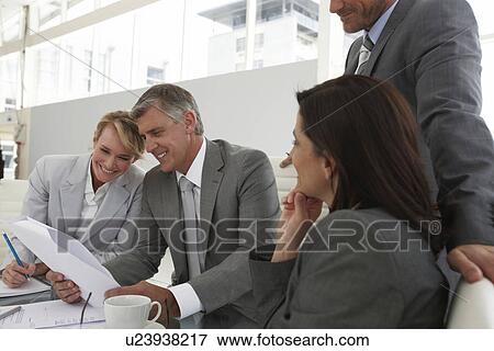 Doing paper work View Large Photo Image Stock Photo - Doing paper work. Fotosearch