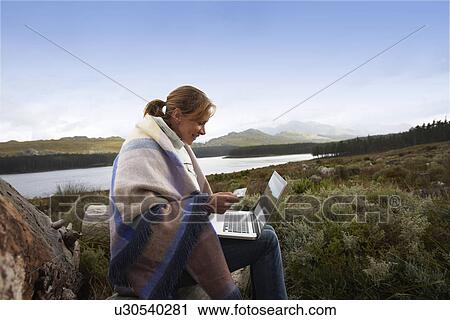 Stock Image - E-commerce in the countryside. Fotosearch