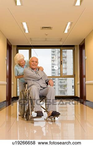 Elderly couple in a hospital View Large Photo Image Stock Photo - Elderly couple in a hospital. Fotosearch