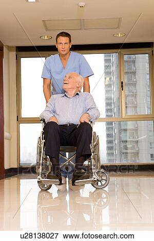 Elderly in a wheelchair View Large Photo Image Stock Photo - Elderly in a wheelchair. Fotosearch