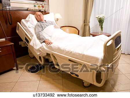 Stock Image - Elderly in hospital. Fotosearch