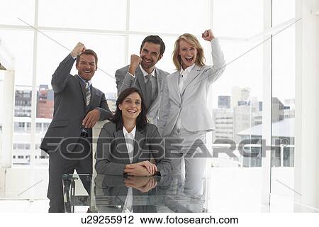 Stock Image - Energetic business team. Fotosearch