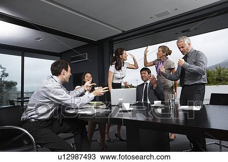 Enthusiastic business team View Large Photo Image Stock Image - Enthusiastic business team. Fotosearch
