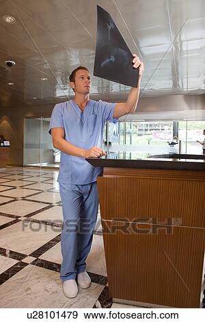 Stock Photo - Examining x-ray. Fotosearch