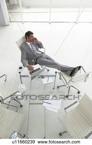 Stock Photo - Executive at work. Fotosearch