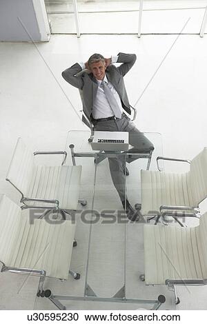 Stock Image - Executive in his office. Fotosearch