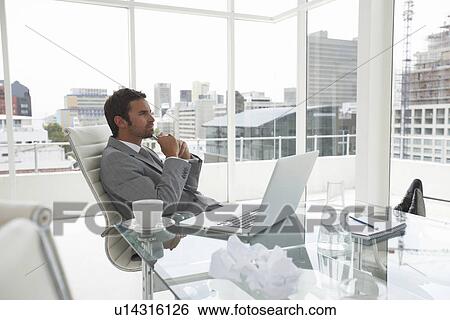 Stock Photograph - Executive thinking. Fotosearch