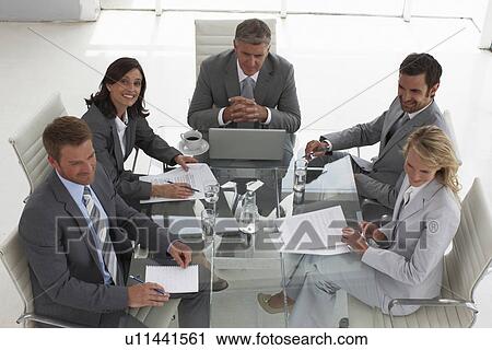 Executives team at a meeting View Large Photo Image Stock Image - Executives team at a meeting. Fotosearch