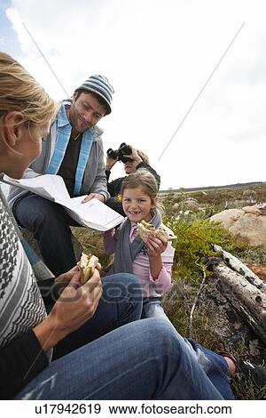 Family hanging out outdoors View Large Photo Image Stock Photo - Family hanging out outdoors. Fotosearch