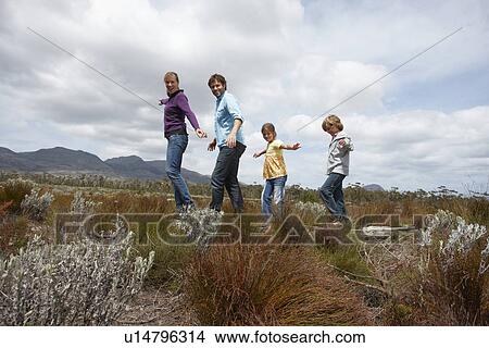 Picture - Family outdoors. Fotosearch