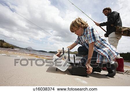 Picture - Father and son fishing. Fotosearch
