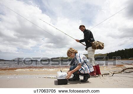 Stock Photography - Father and son fishing. Fotosearch