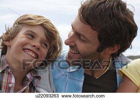 Stock Image - Father and son portrait. Fotosearch