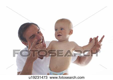 Stock Image - Father with his baby boy. Fotosearch