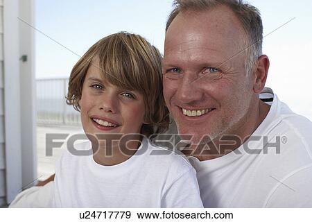 Stock Photo - Father with his son portrait. Fotosearch