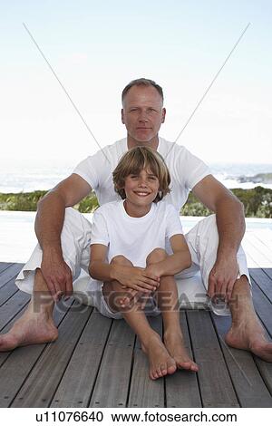 Father with his son View Large Photo Image Stock Image - Father with his son. Fotosearch