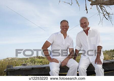 Father with his son View Large Photo Image Stock Image - Father with his son. Fotosearch