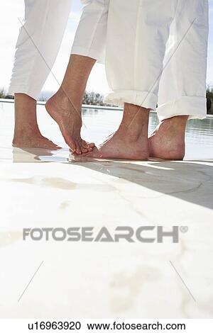 Feet of a couple View Large Photo Image Stock Image - Feet of a couple. Fotosearch