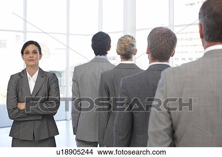 Female executive with her team View Large Photo Image Picture - Female executive with her team. Fotosearch