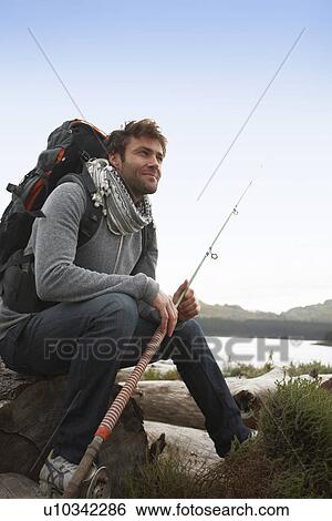 Fisherman in the early hours View Large Photo Image Stock Photograph - Fisherman in the early hours. Fotosearch