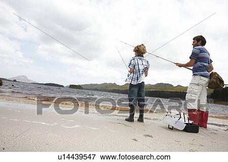 Fishing at a lake View Large Photo Image Stock Photo - Fishing at a lake. Fotosearch