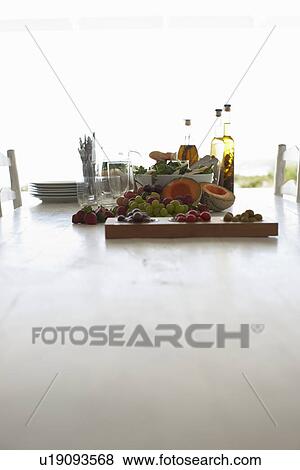 Food on a table View Large Photo Image Stock Photo - Food on a table. Fotosearch