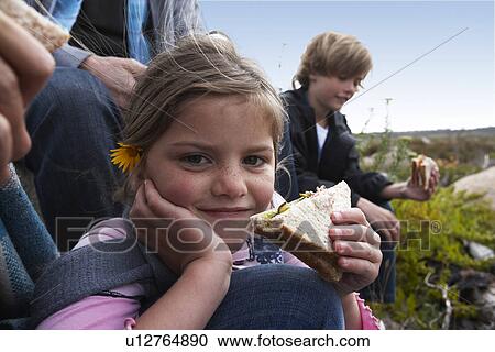 Girl eating sandwich View Large Photo Image Stock Image - Girl eating sandwich. Fotosearch
