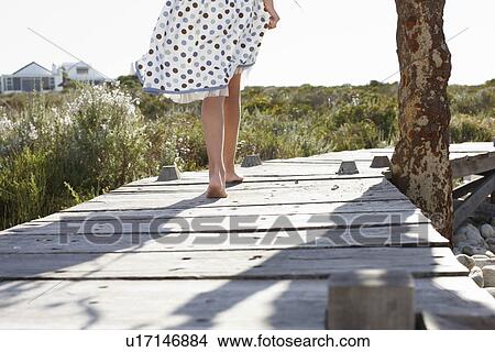 Picture - Girl walking. Fotosearch