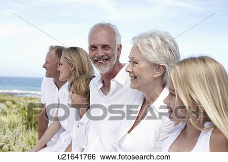 Grandfather with his family View Large Photo Image Stock Photograph - Grandfather with his family. Fotosearch