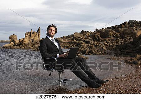 Guy with a computer View Large Photo Image Stock Image - Guy with a computer. Fotosearch