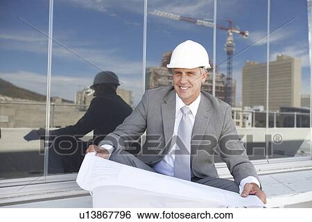 Stock Photograph - Happy architect. Fotosearch