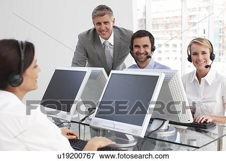 Stock Photo - Happy business people. Fotosearch
