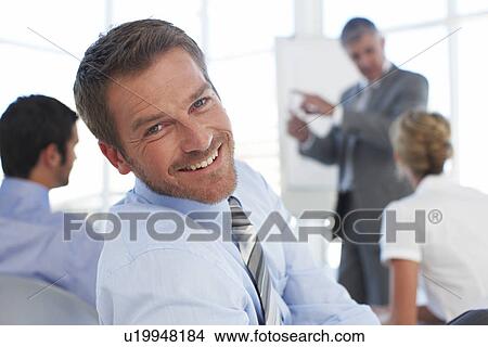 Picture - Happy businessman close up. Fotosearch
