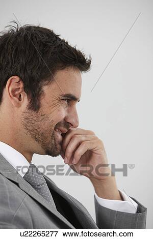 Happy businessman profile View Large Photo Image Stock Photo - Happy businessman profile. Fotosearch